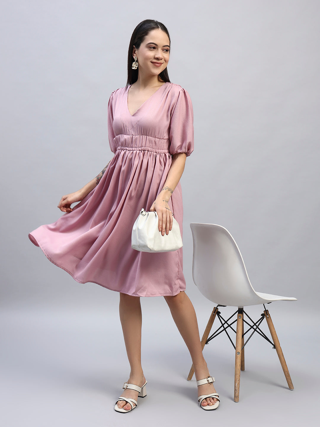 Women Pink Solid Flared Dress.