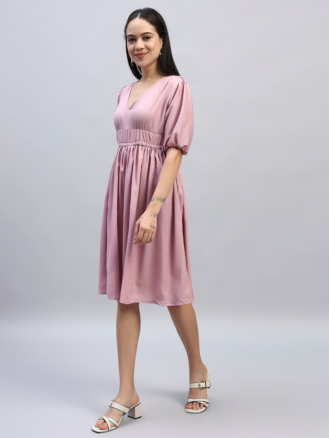 Women Pink Solid Flared Dress.