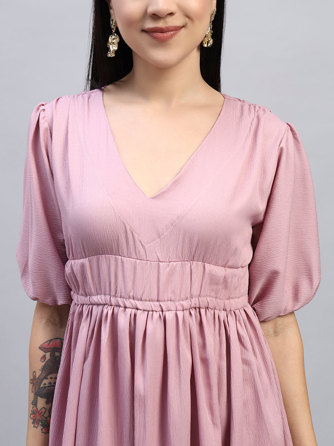 Women Pink Solid Flared Dress.